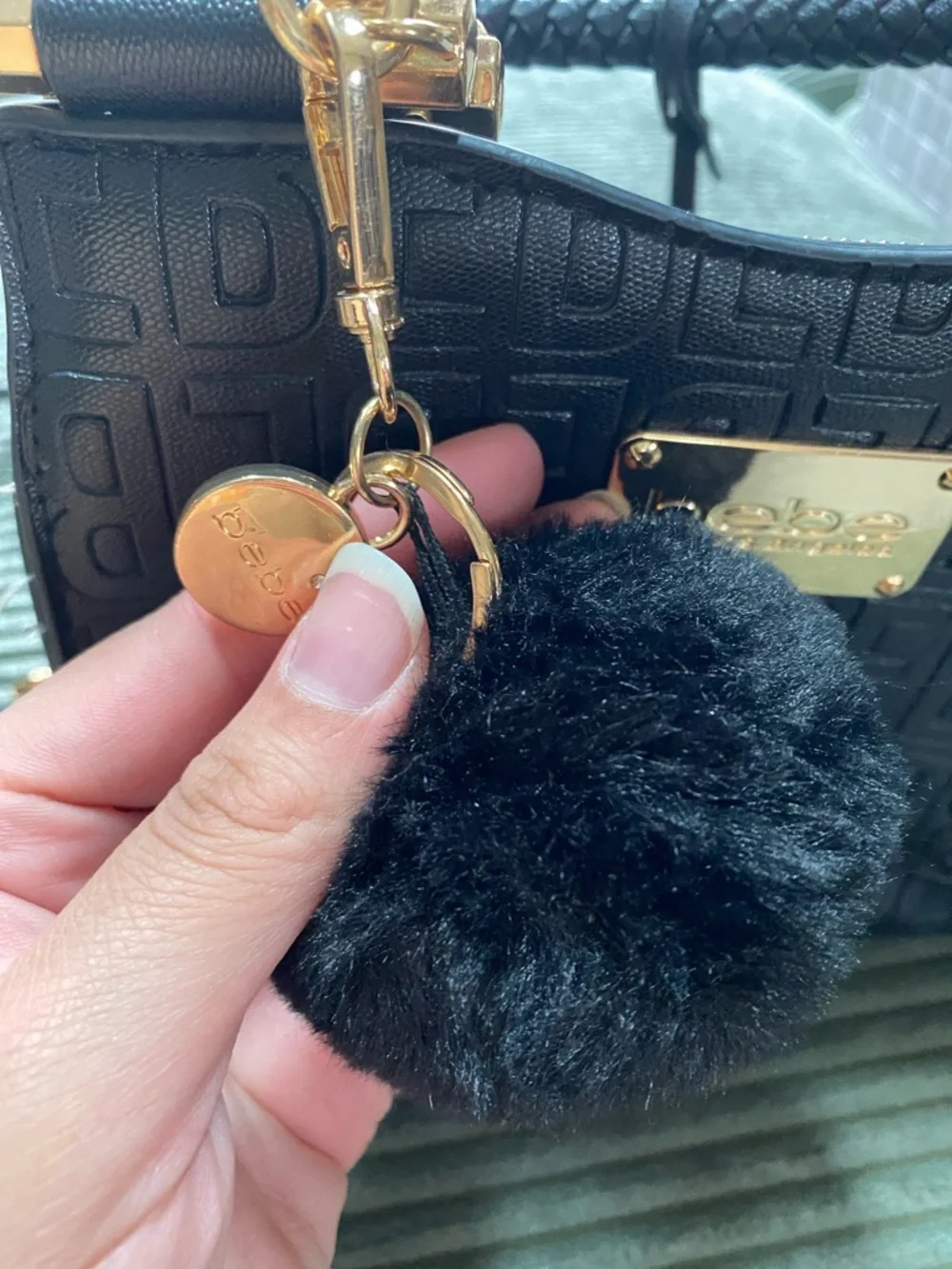 bebe Black Embossed Logo Satchel with Pom Charm